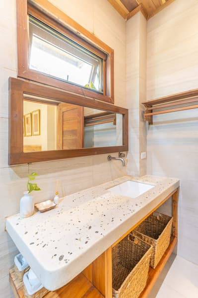 The Residence — hand-carved wooden basin sink